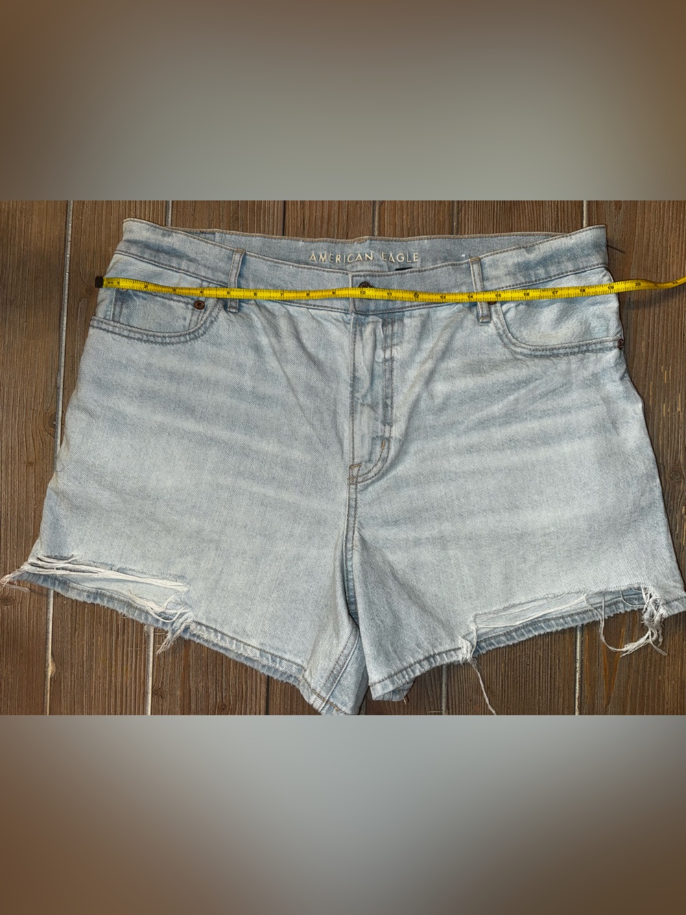 American Eagle Outfitters Relxed Fit Light Wash Distressed Denim Cutoff Shorts - Picture 7 of 12